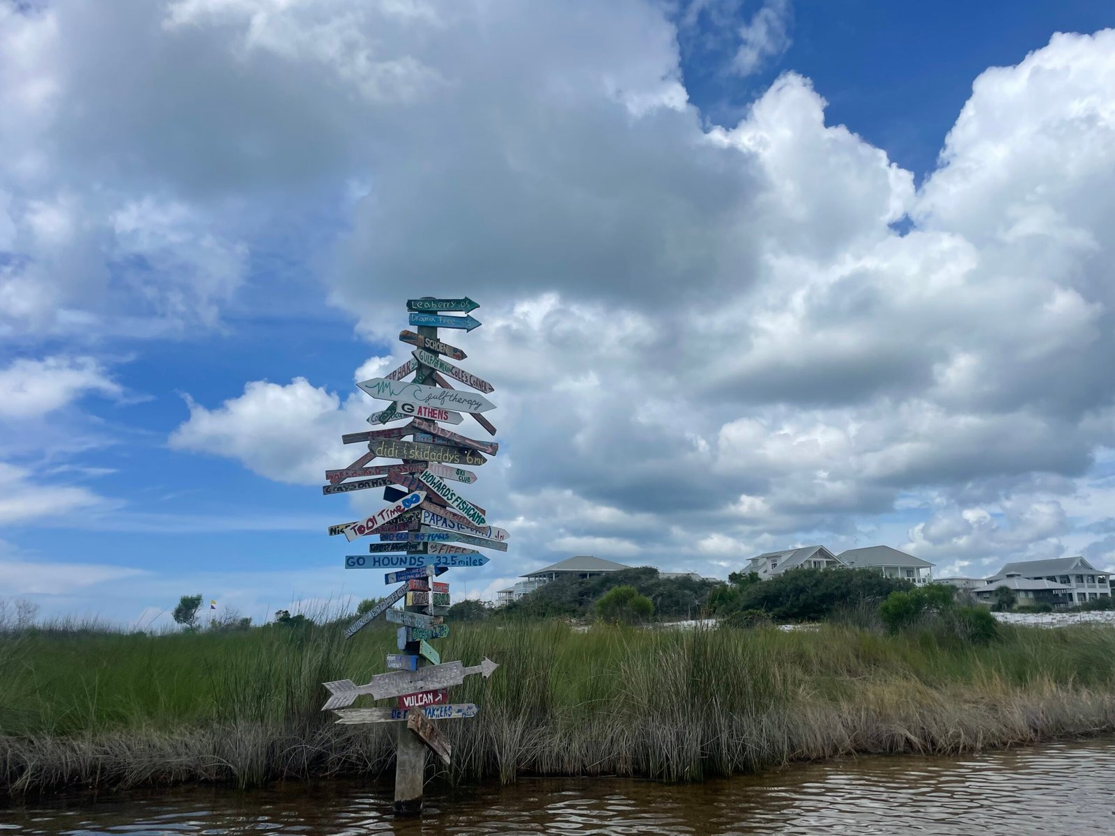 Grayton Beach signpost near the dunes and water