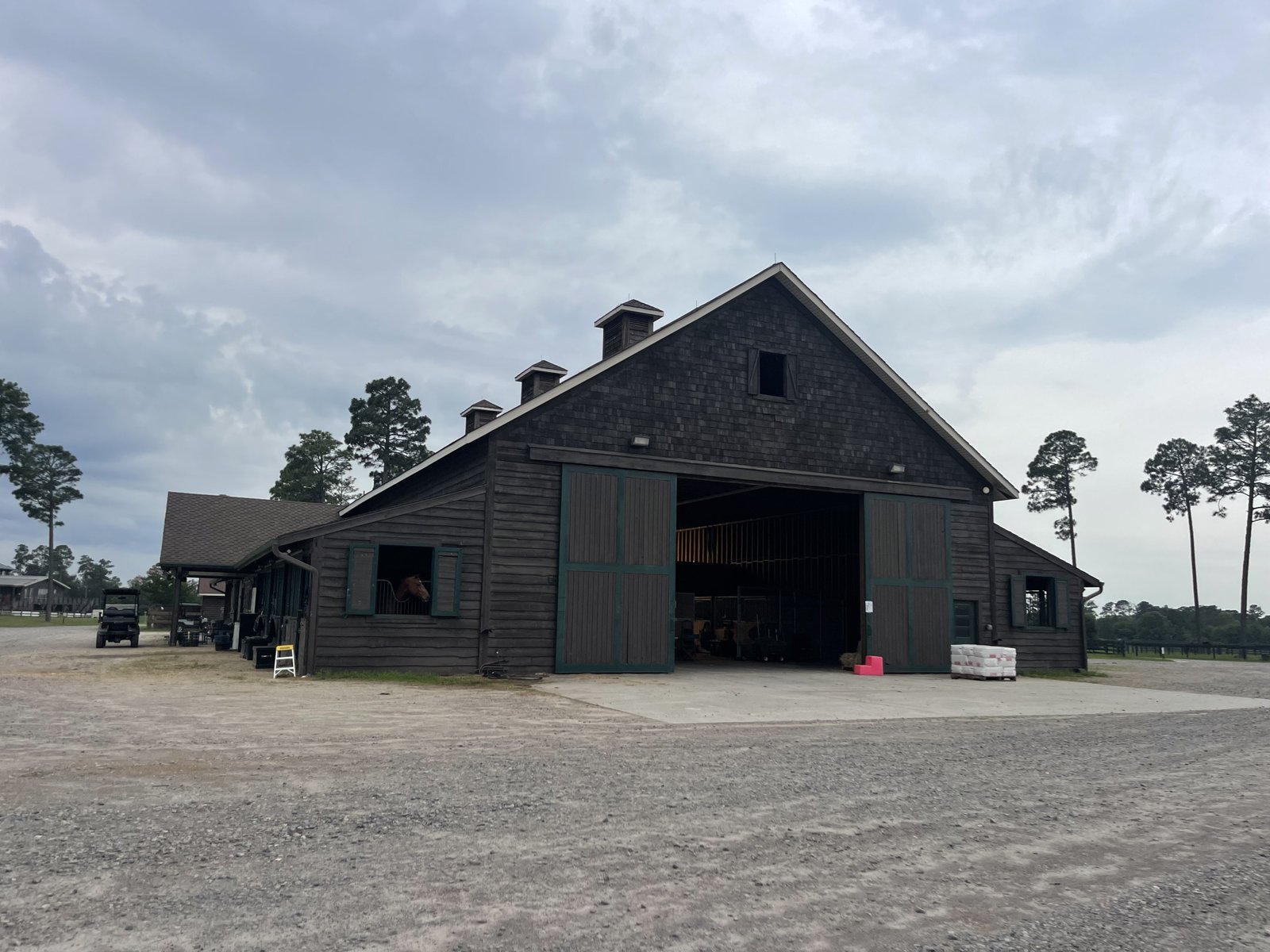 Black barn and event facility at Stable View Equestrian in Aiken, South Carolina