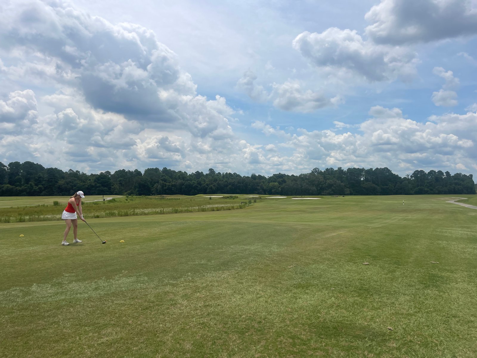 Open fairway under dramatic clouds at Brazell's Creek Golf Course